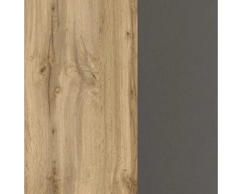 Vue de surface d'une combinaison de façades en décor chêne clair avec veinage et une surface lisse gris foncé.