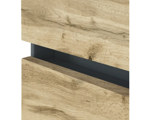 Vue détaillée d'un meuble de salle de bain aspect chêne avec poignée intégrée en anthracite.