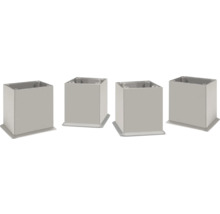 Quatre pieds de meuble carrés en plastique avec trous de montage.