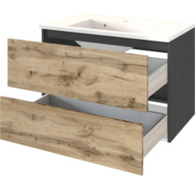 Waschtischunterschrank mit weißem Waschbecken und zwei geöffneten Schubladen mit Fronten in Holzoptik und anthrazitfarbenem Korpus.