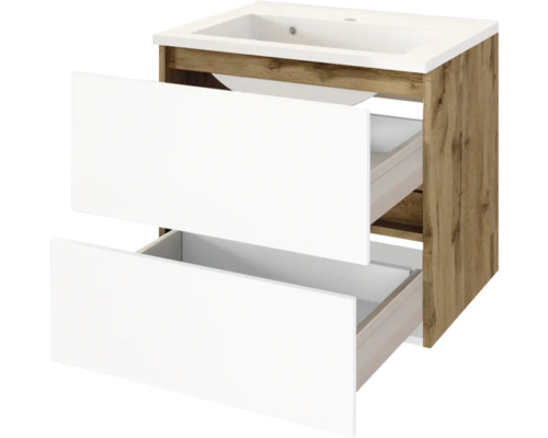 Waschbeckenunterschrank in Holzoptik mit zwei geöffneten weissen Schubladen und integriertem weissem Waschbecken.