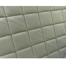 Nahaufnahme eines gesteppten Stoffes mit quadratischem Muster