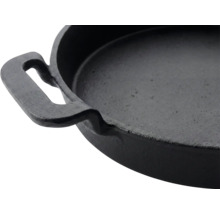 Poêle en fonte avec poignée