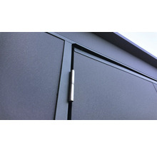 Gros plan d'une porte de garage avec charnière