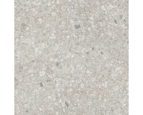 Carreau en grès cérame aspect terrazzo gris avec inclusions de pierre.