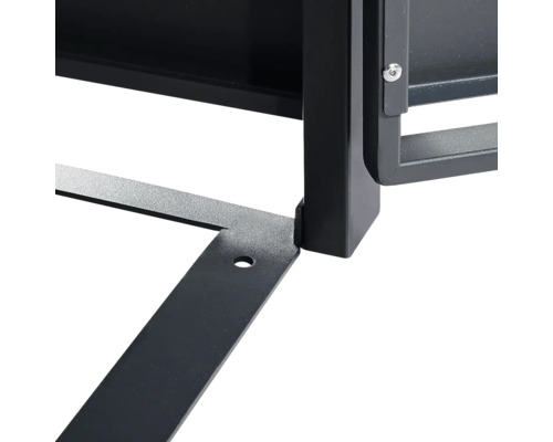 Vue détaillée d une structure métallique noire avec pied et trou pré-percé pour la fixation au sol.