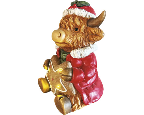 Figurine de Noël vache Highland avec bonnet de Noël, manteau rouge et étoile en pain d'épices lumineuse.