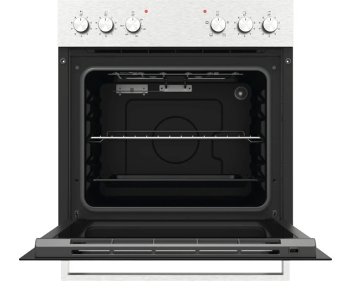 Four encastrable avec porte ouverte, bandeau de commande en acier inoxydable à six manettes, intérieur noir avec grille et plaque de cuisson.