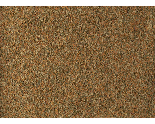 Flocons de nourriture pour poissons d'ornement de différentes couleurs.