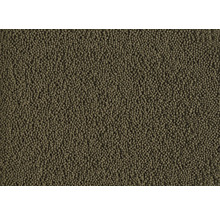 Gros plan de petits granulés ronds pour poissons.