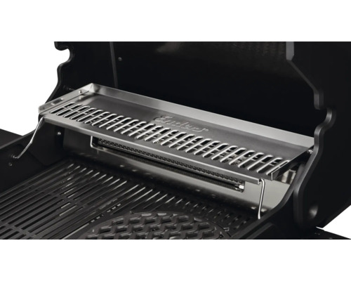 Grille de maintien au chaud Enders en acier inoxydable pour barbecues à gaz, située au-dessus de la grille de cuisson principale.