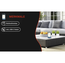 Lampe de table à LED portable sur une table de jardin, réglable par paliers, câble USB-C inclus.