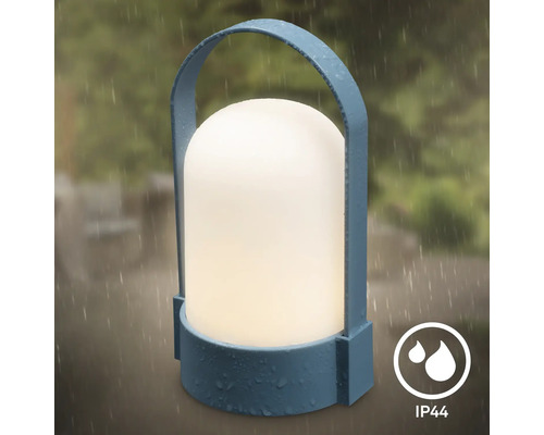 Lampe LED d'extérieur portable bleue avec poignée et corps lumineux blanc, protégée contre les projections d'eau IP44.