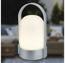 Lampe de table à LED portable avec socle et poignée en étrier de couleur argentée, abat-jour en forme de dôme, lumière blanc chaud.