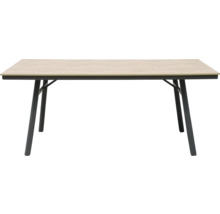 Table rectangulaire moderne avec un plateau aspect bois clair et quatre pieds évasés en métal noir.