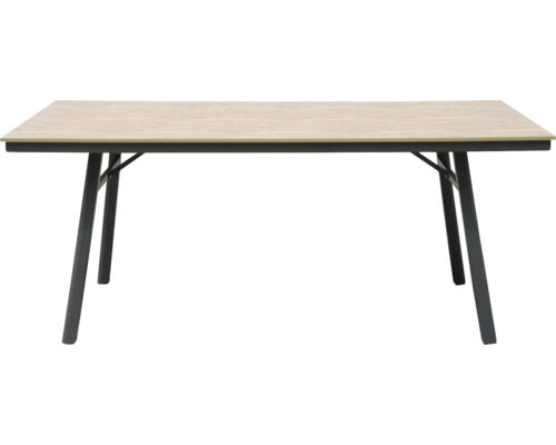 Table rectangulaire moderne avec un plateau aspect bois clair et quatre pieds évasés en métal noir.