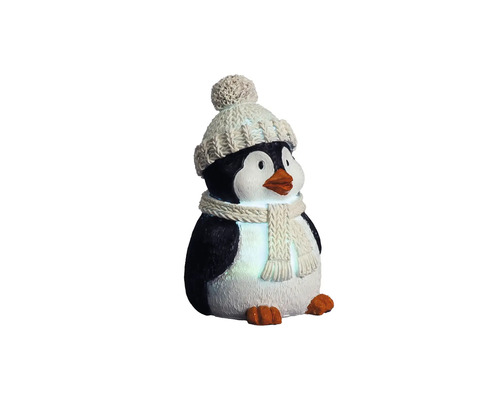 Figurine pingouin noir et blanc avec éclairage LED, bonnet tricoté et écharpe. Décoration de Noël pour l'intérieur.