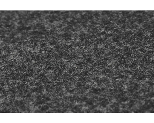 Gros plan d un feutre aiguilleté gris en fibres synthétiques pour les revêtements de sol ou le bricolage.
