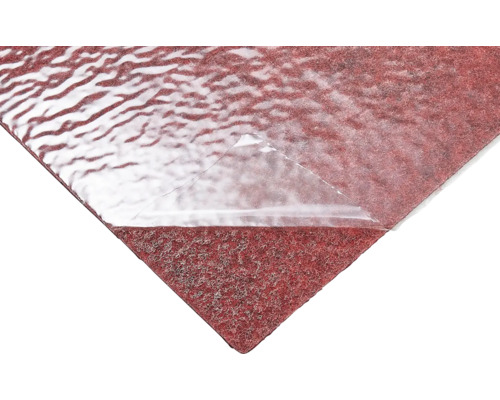 Rotes selbstklebendes Schutzvlies mit teilweise abgezogener transparenter Folie.