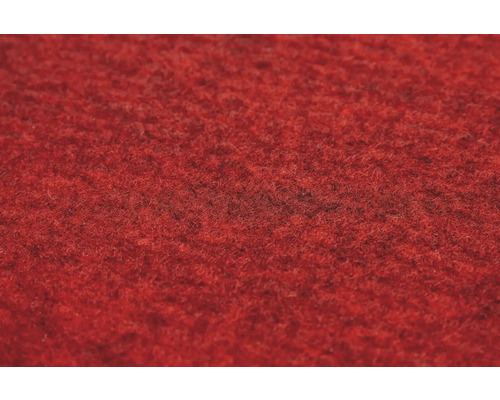 Gros plan sur la texture d un tapis rouge en feutre aiguilleté.