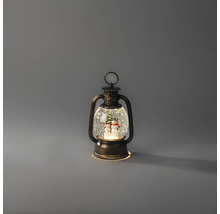 Beleuchtete dekorative Laterne in Bronze-Optik mit Schneekugel-Effekt, Schneemann und Weihnachtsbaum im Inneren.