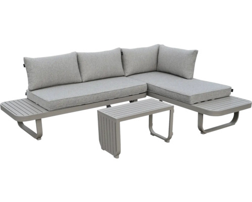 Salon de jardin avec canapé d'angle, tablettes intégrées et table basse, structure en métal gris, coussins gris.