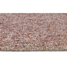 Vue rapprochée d'une moquette bouclée avec une surface texturée.