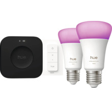 Philips Hue Starter Set mit zwei E27 LED Lampen White and Color Ambiance, einer Bridge und einem Dimmschalter für smarte Lichtsteuerung.