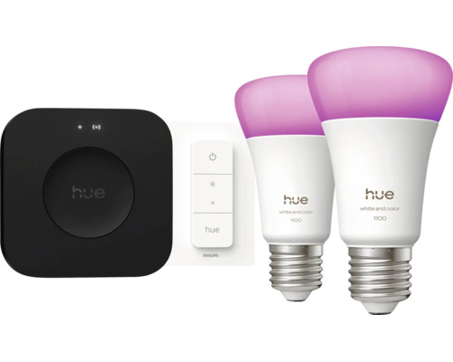 Philips Hue Starter Set mit zwei E27 LED Lampen White and Color Ambiance, einer Bridge und einem Dimmschalter für smarte Lichtsteuerung.