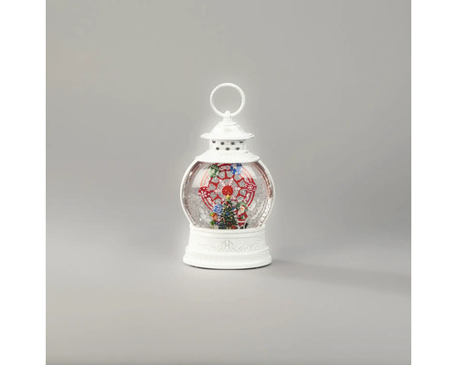 Lanterne de Noël blanche en forme de boule à neige avec sapin, Père Noël et grande roue à l'intérieur.