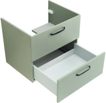 Meuble sous-vasque vert avec deux tiroirs et poignées noires, le tiroir du bas est ouvert.