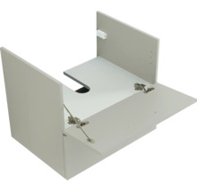 Vue intérieure d un corps de meuble sous-lavabo gris clair avec découpe pour siphon dans le fond et abattant ouvert avec charnières métalliques.