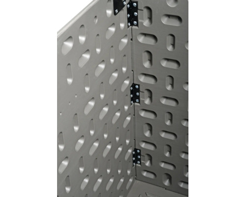 Vue intérieure d une boîte de rangement en plastique avec charnières en métal et parois structurées.