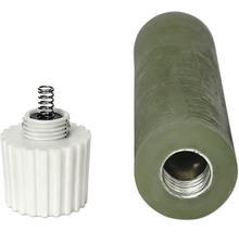 Pièce de rechange pour soupape de décharge avec pièce en plastique blanc avec ressort et douille de guidage verte.