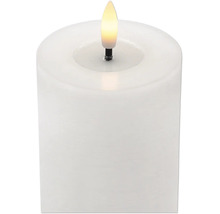 Bougie pilier électrique blanche en cire véritable avec flamme vacillante.