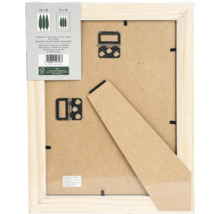 Rückseite eines Bilderrahmens aus Holz mit MDF-Rückwand, Aufstellfuß und Metallaufhängern.