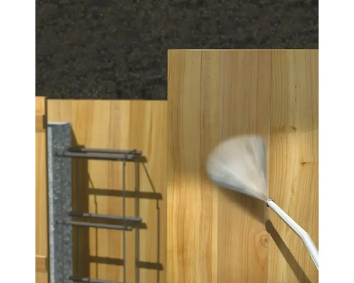 Pulvérisation d'une surface en bois avec une buse de pulvérisation pour la protection ou l'entretien.