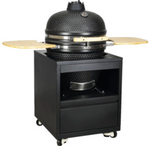Barbecue en céramique Kamado avec surface texturée, thermomètre et tablettes latérales en bois sur un chariot à roulettes noir avec tiroir.