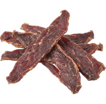 Lamelles de viande séchée comme friandise ou récompense pour chiens.