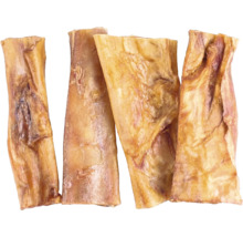 Friandises à mâcher séchées pour chiens de différentes formes et tailles.