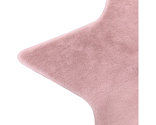 Sternenförmiger Teppich aus rosa Kunstfell.