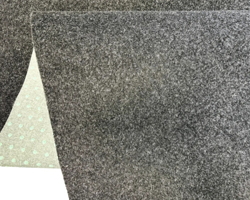 Feutre aiguilleté gris foncé avec envers antidérapant et motif circulaire.
