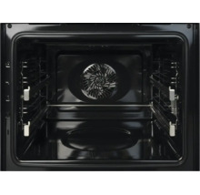Vue intérieure d'un four avec ventilateur à convection, grilles latérales et rails télescopiques.