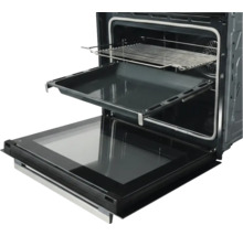 Four encastrable ouvert avec plaque de cuisson et grille sur rails télescopiques.