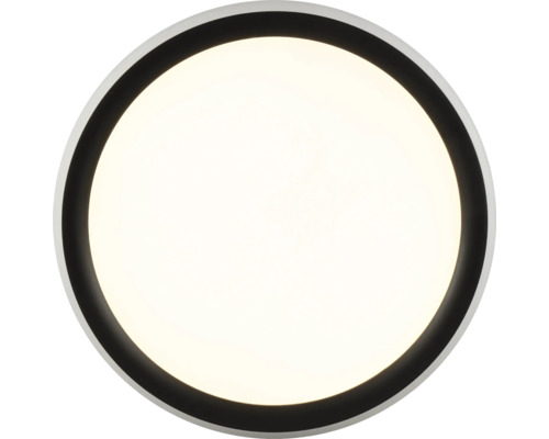 Plafonnier rond avec un cadre noir.