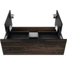 Tiroir ouvert d'un meuble sous-vasque avec découpe pour siphon, aspect bois et intérieur noir.