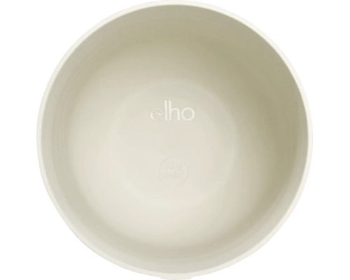 Vue intérieure d'un pot de fleurs rond en plastique avec elho Logo et symbole 100 pour cent recyclable.