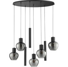 Suspension avec plusieurs globes en verre et éléments cylindriques sur une plaque de plafond ronde.