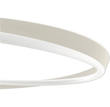 Gros-plan d'un luminaire LED blanc de forme circulaire au design moderne.