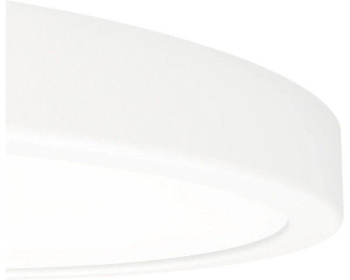 Plafonnier rond en plastique blanc.